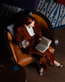 guest reading in hotel restaurant