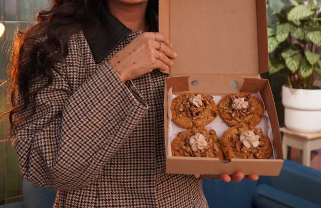 woman opening cookie box