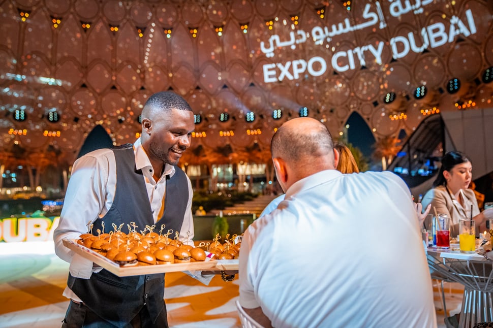TGP International catering services at Expo City Dubai event with gourmet food presentation