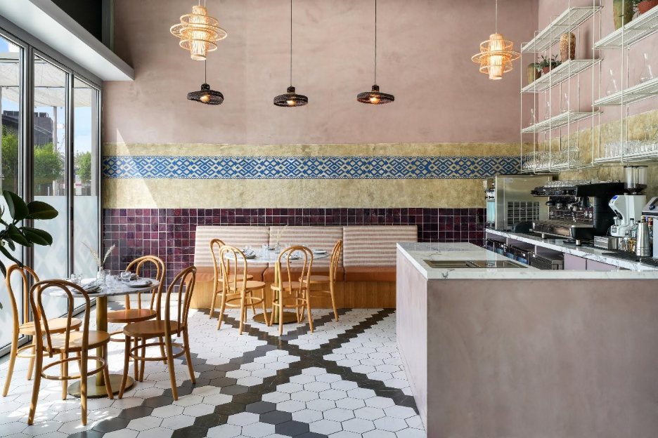 A restaurant with tables and chairs