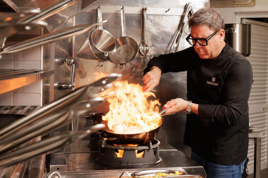 A person cooking in a kitchen