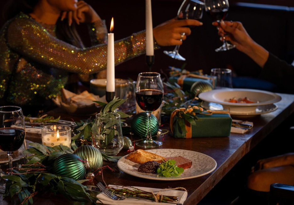 A table with food and wine glasses
