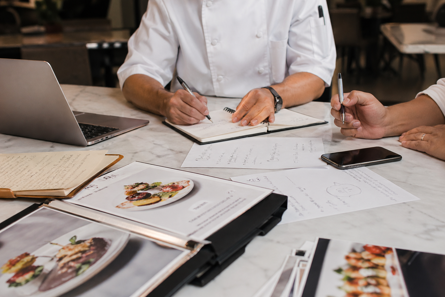chefs at a table