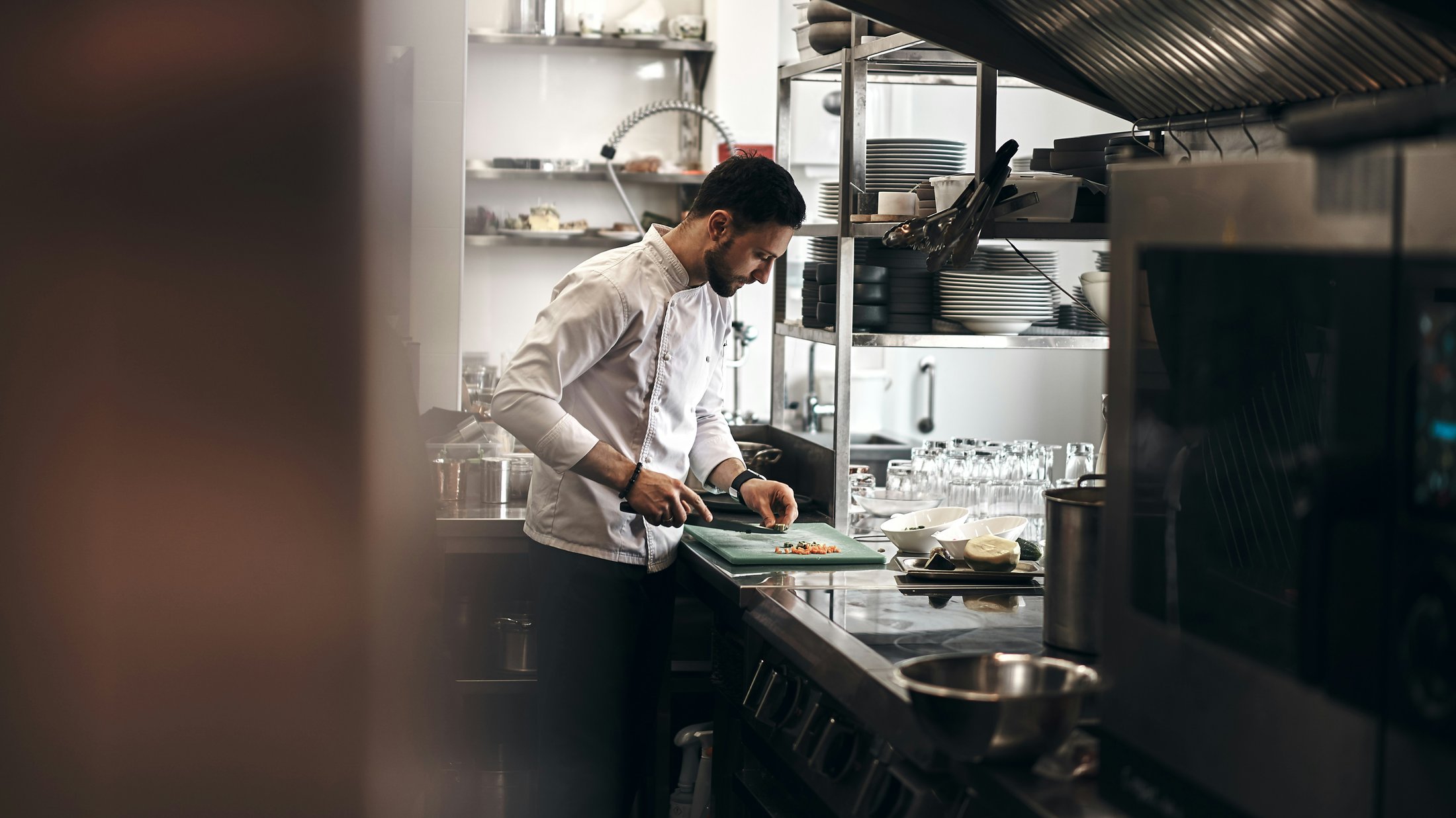 chef in the kitchen preparing food