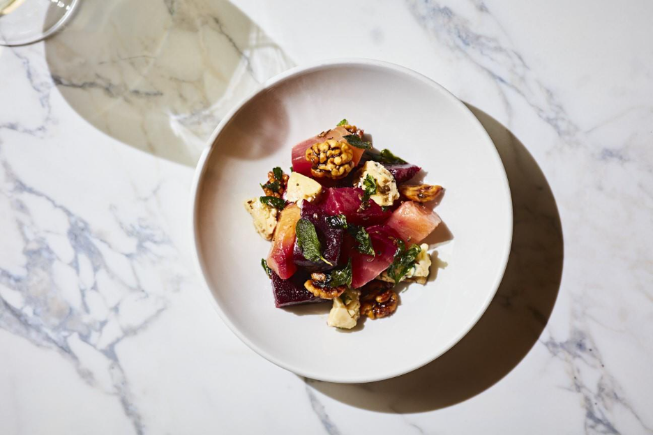 A plate of food on a marble surface

AI-generated content may be incorrect.